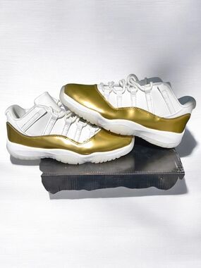 Jordan 11 Men’s Low Top Athletic Shoes in White and Metallic Gold